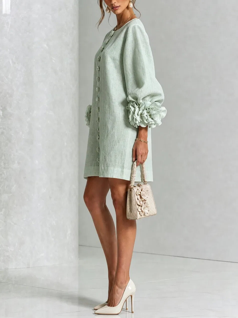 Odette | Robe texturée à col rond et poignets fleuris