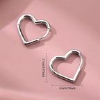 Gaëlle - Boucles d'oreilles dorées en forme de cœur en acier inoxydable