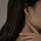 Gaëlle - Boucles d'oreilles dorées en forme de cœur en acier inoxydable