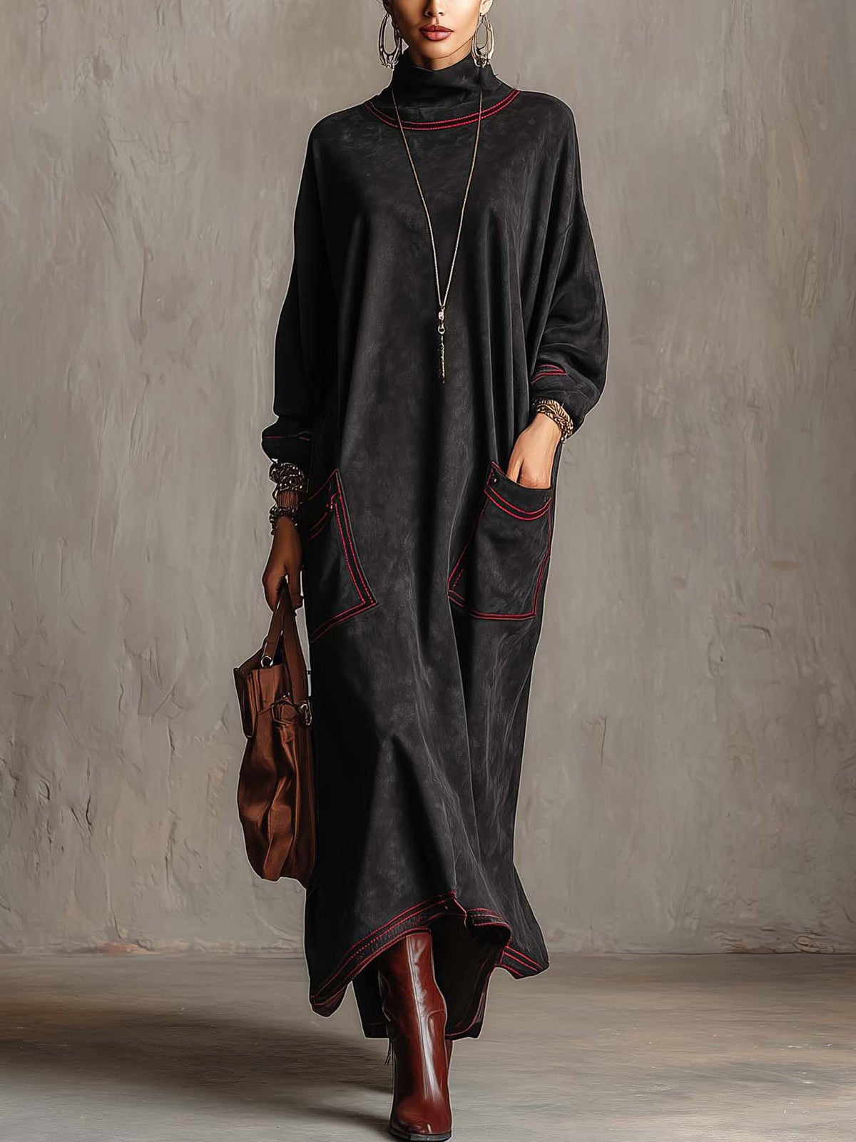Manon | Robe longue noire à surpiqûres contrastées et poches plaquées