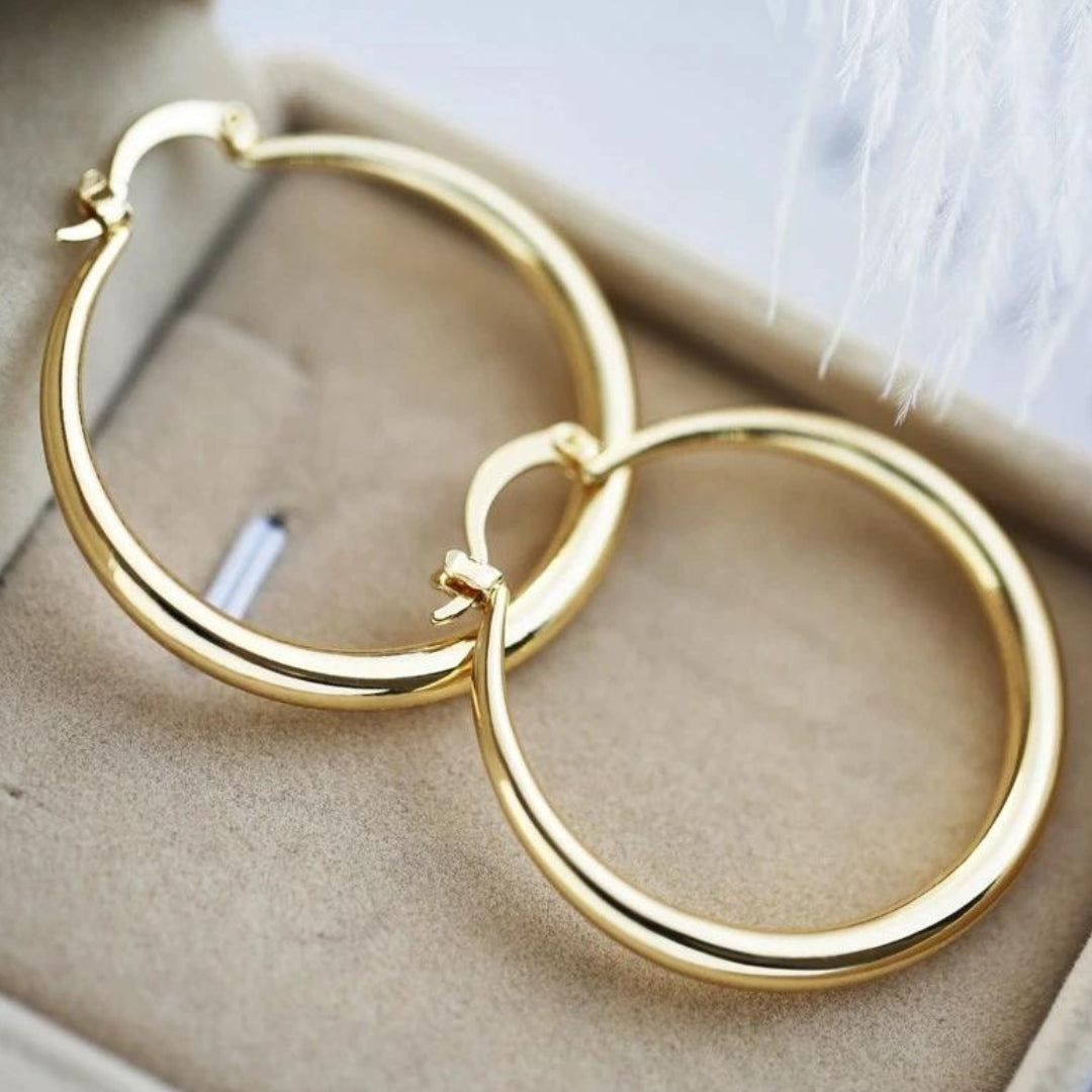 Roxane - Boucles d'oreilles dorées à fort impact