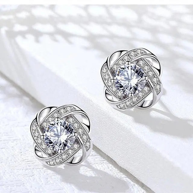 Mélodie - Boucles d'oreilles dorées en spirale avec cristaux