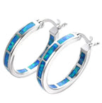 Flavie - Boucles d'oreilles chics circulaires avec opale de feu bleue