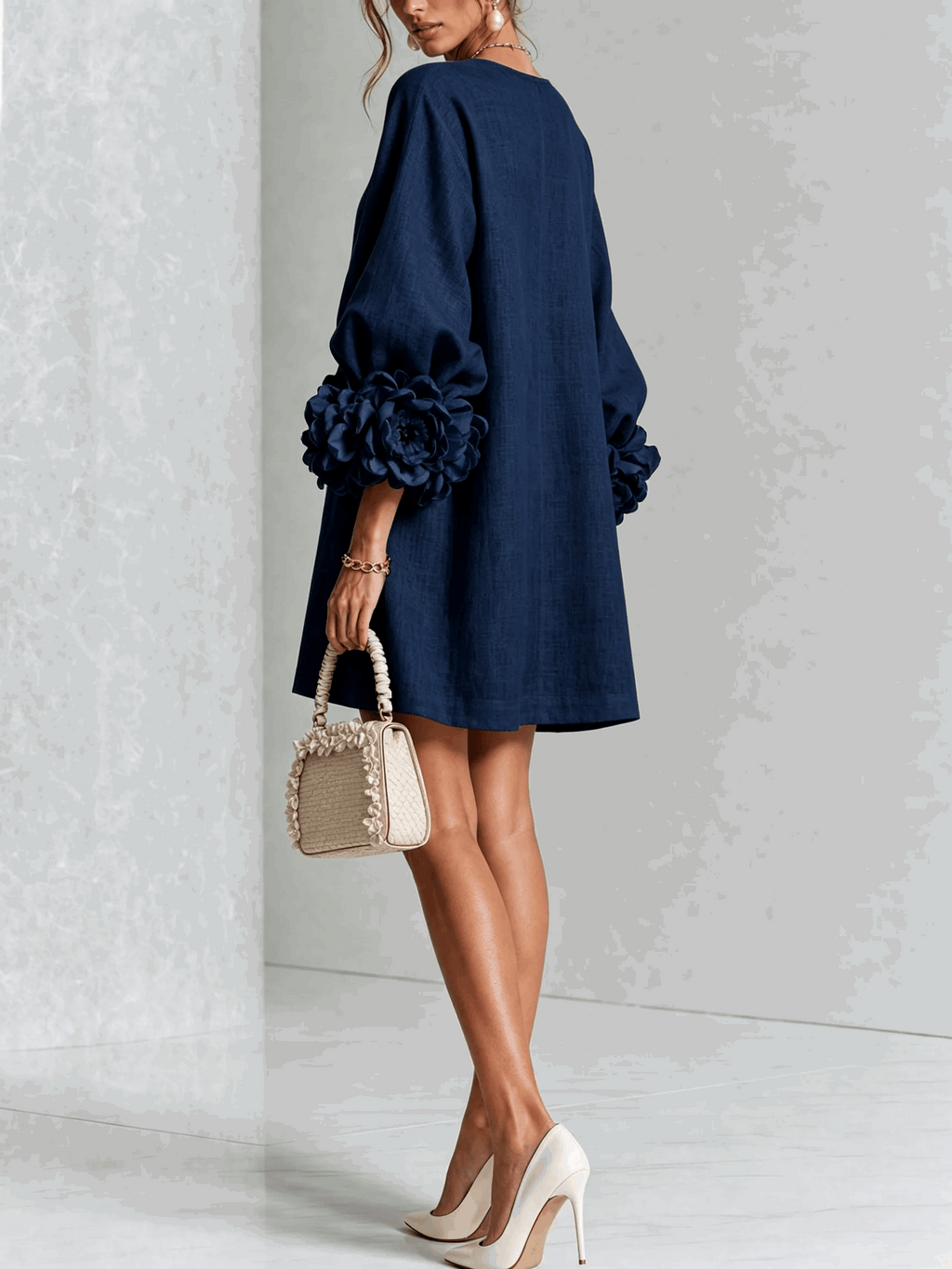 Paloma | Vestido texturizado de escote redondo y puños florales