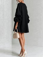 Paloma | Vestido texturizado de escote redondo y puños florales